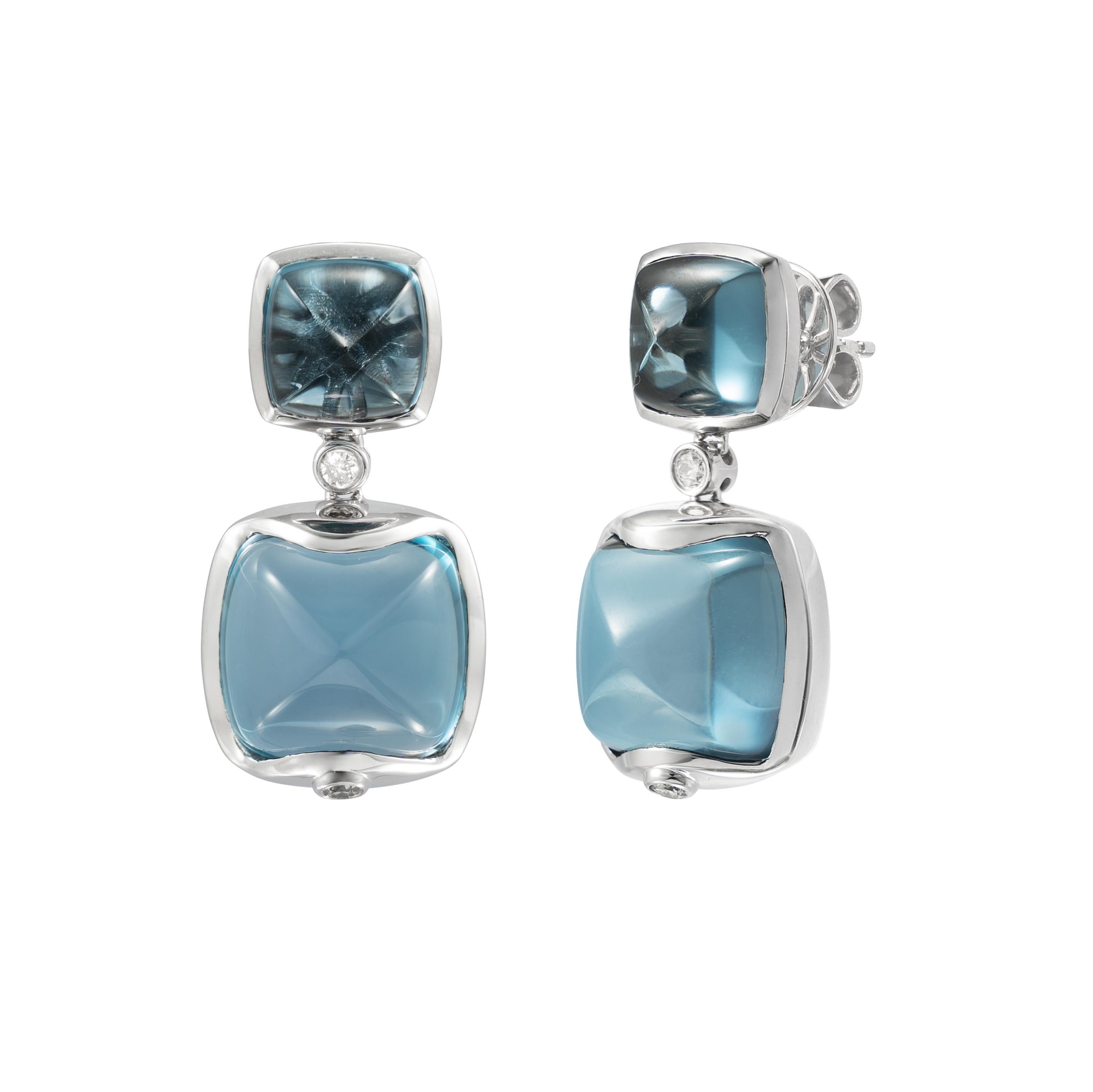 Sweet Sugarloaves! Light and easy to wear these earrings showcase beautiful sugarloaf gemstones accented with a gold frame and diamonds. These earrings are dainty yet have a great pop of color from the vibrant gems.

Blue Topaz Sugarloaf Earrings