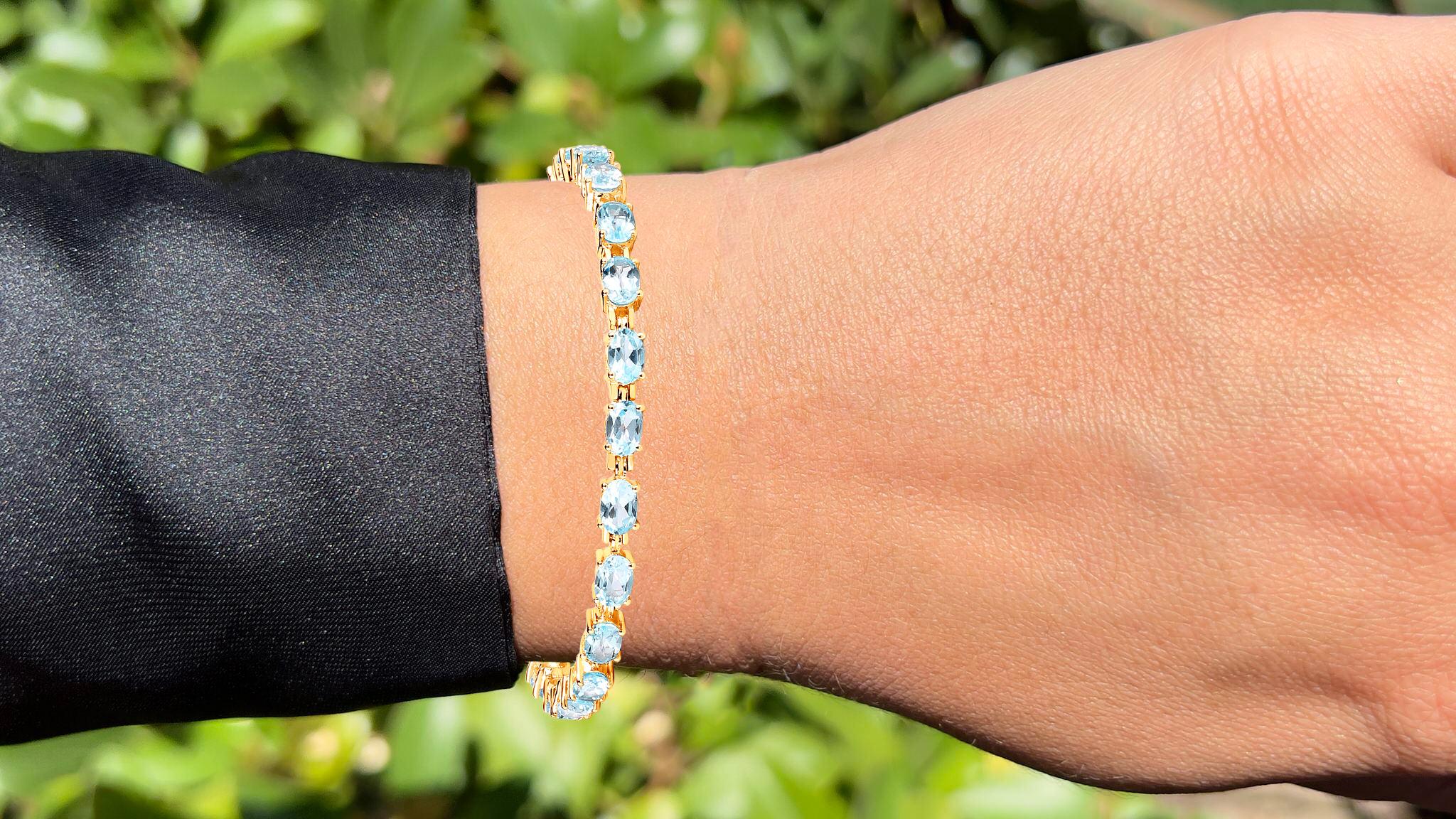 It comes with the Gemological Appraisal by GIA GG/AJP
All gemstones are natural
22 Blue Topazes = 11.20 Carats
Metal: 14K Yellow Gold Plated Sterling Silver
Length: 7.25 Inches
It can be shortened upon request