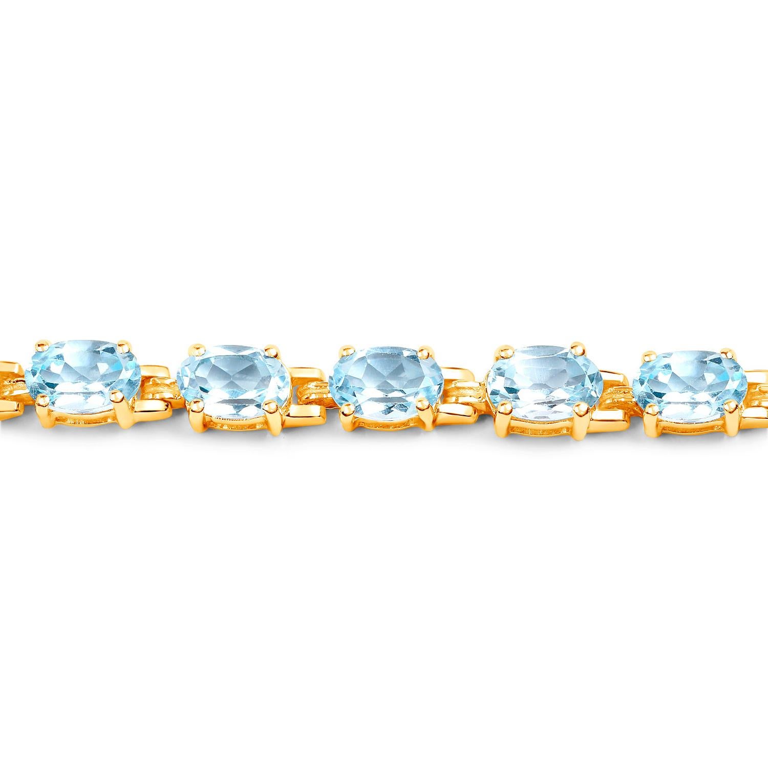 Oval Cut Blue Topaz Tennis Bracelet 11.2 Carats 14K Yellow Gold Plated Silver For Sale