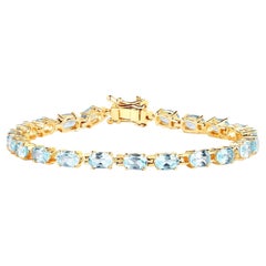 Blue Topaz Tennis Bracelet 11.2 Carats 14K Yellow Gold Plated Silver