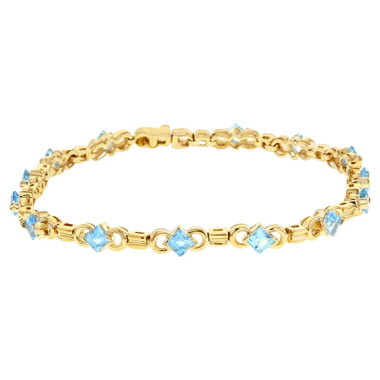 Blue Topaz Tennis Bracelet 14k Yellow Gold
