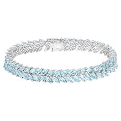 Blue Topaz Tennis Bracelet 15 Carats 18K White Gold Plated Silver
