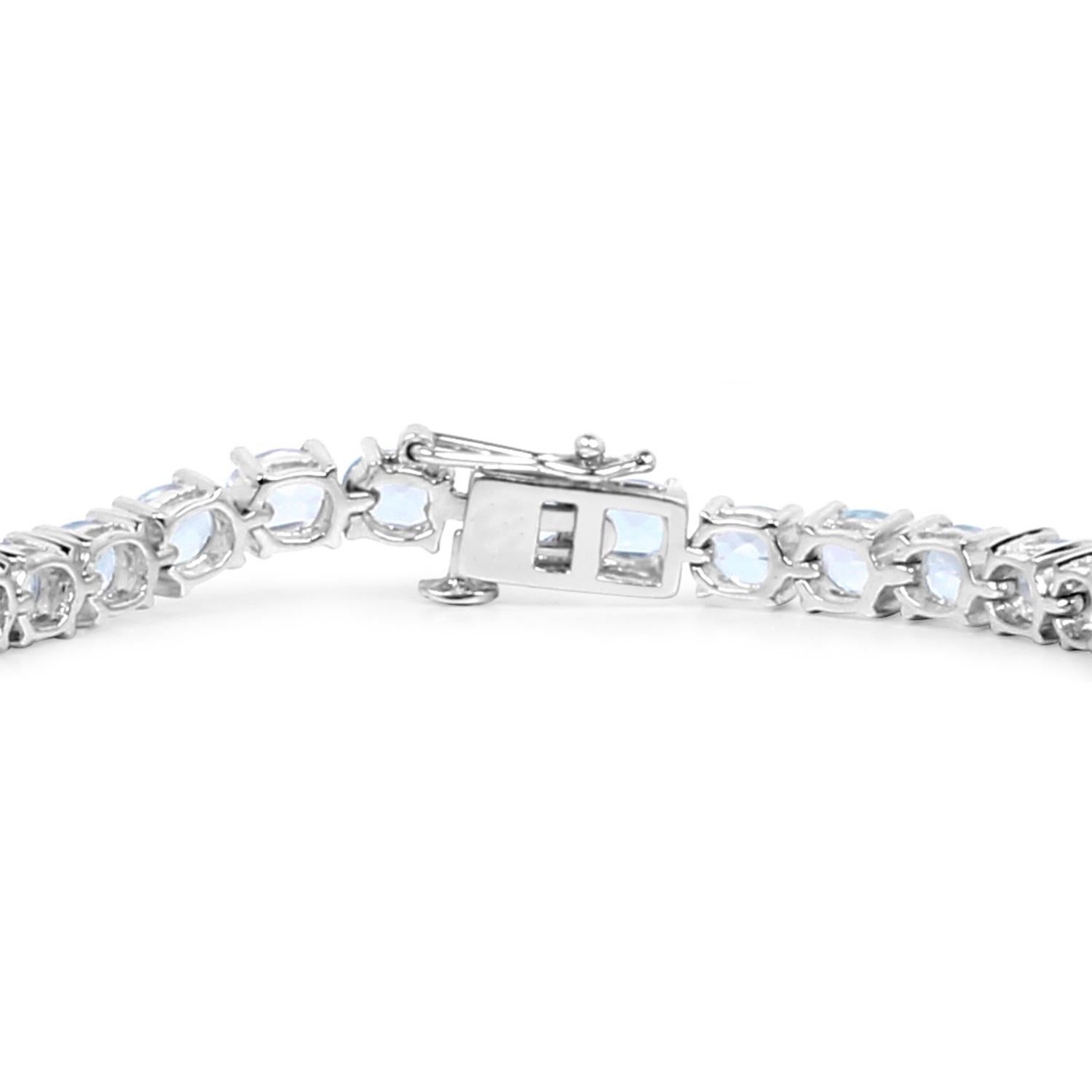 Taille ovale Bracelet tennis en argent sterling 18 carats en vente