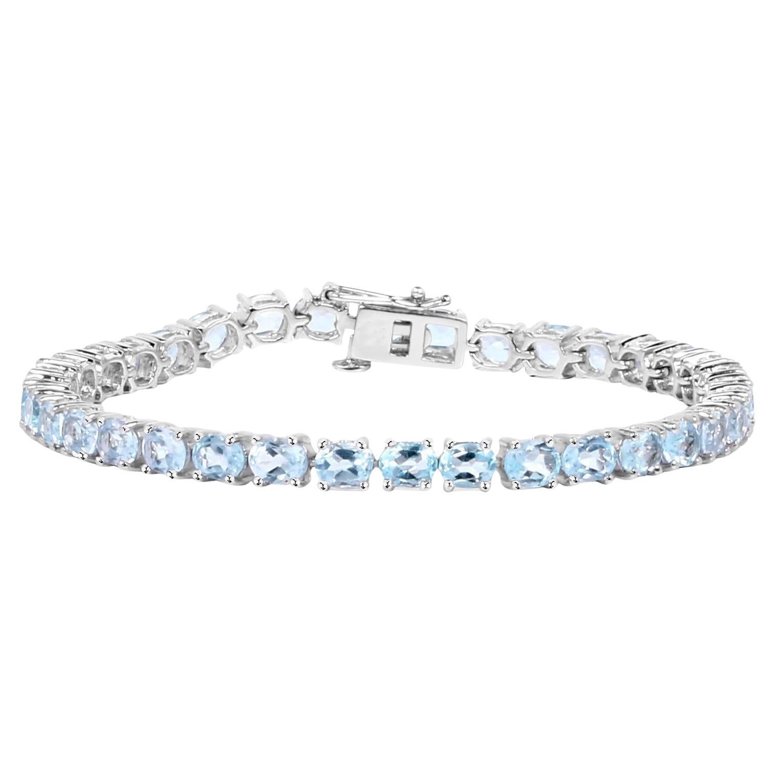 Blue Topaz Tennis Bracelet 18 Carats Sterling Silver For Sale