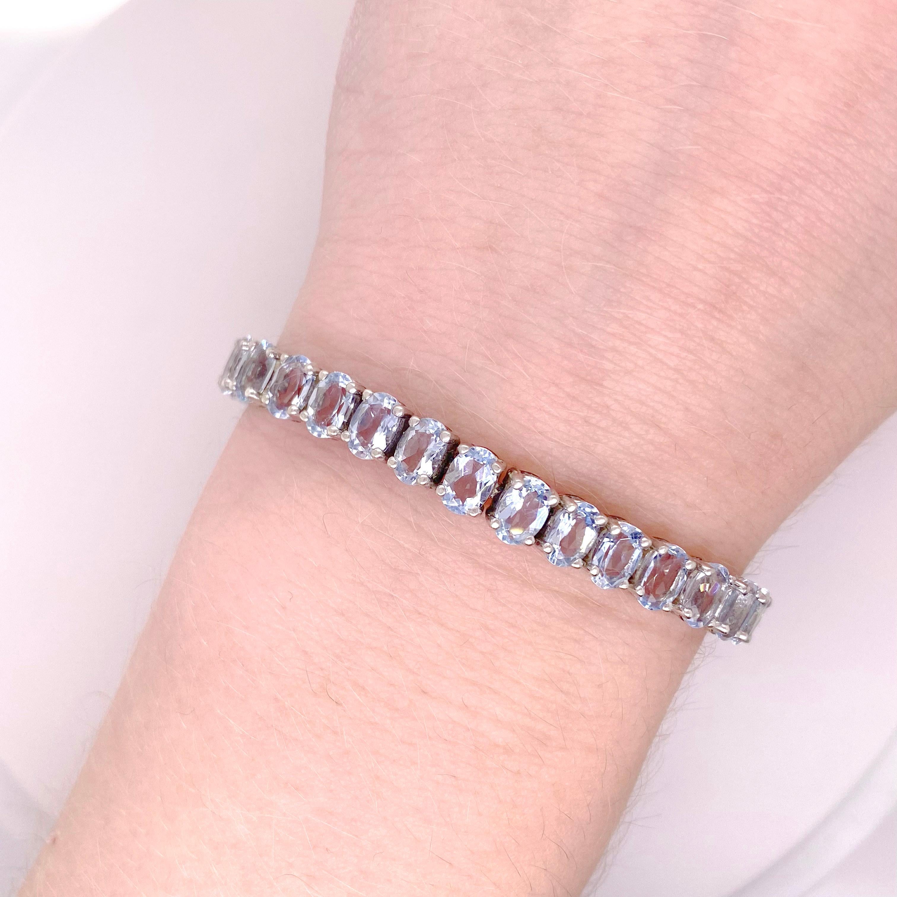 The details for this gorgeous bracelet are listed below:
Bracelet Type: Tennis
Metal Quality: Sterling Silver
Length: 7.5 inches
Width: 4 millimeters
Clasp: Hidden with a Safety Latch
Gemstone: Blue Topaz
Gemstone Color: Blue
Gemstone Number: