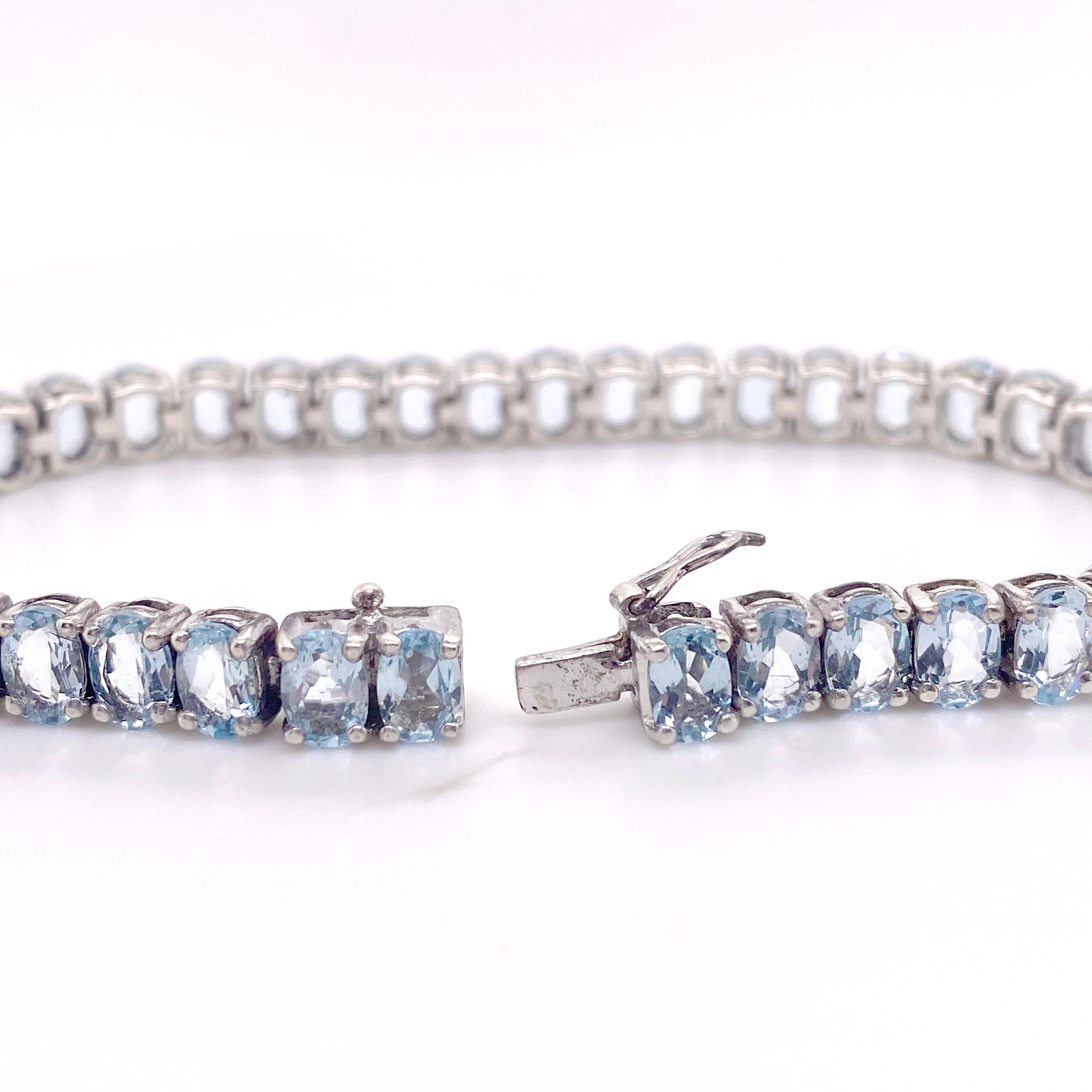 Taille ovale Bracelet tennis en argent sterling avec topaze bleue de 20 carats en vente
