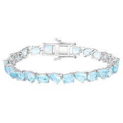 Pulsera de tenis de topacio azul 24.3 quilates Plata