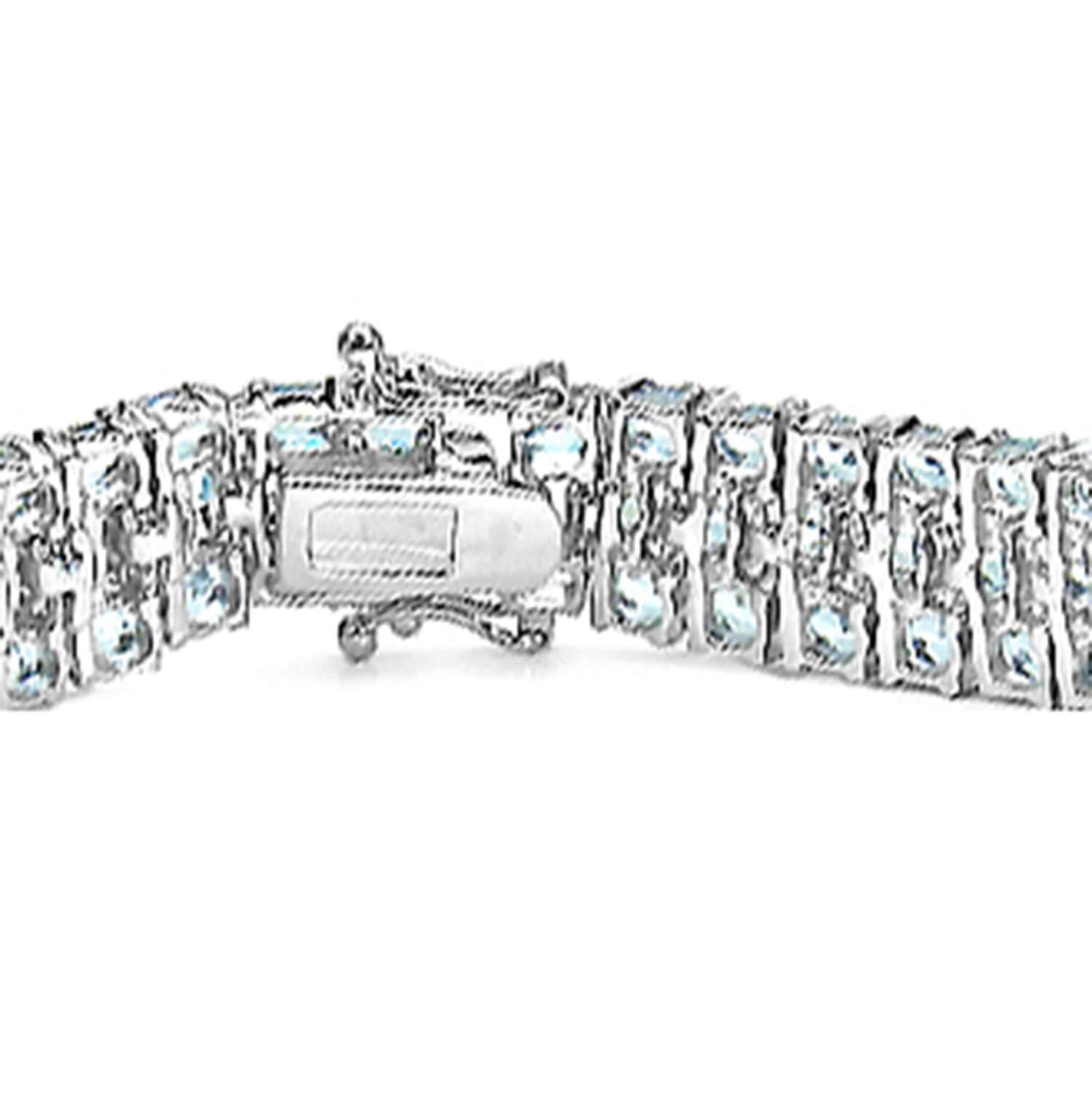 Oval Cut Blue Topaz Tennis Bracelet 26 Carats Sterling Silver For Sale