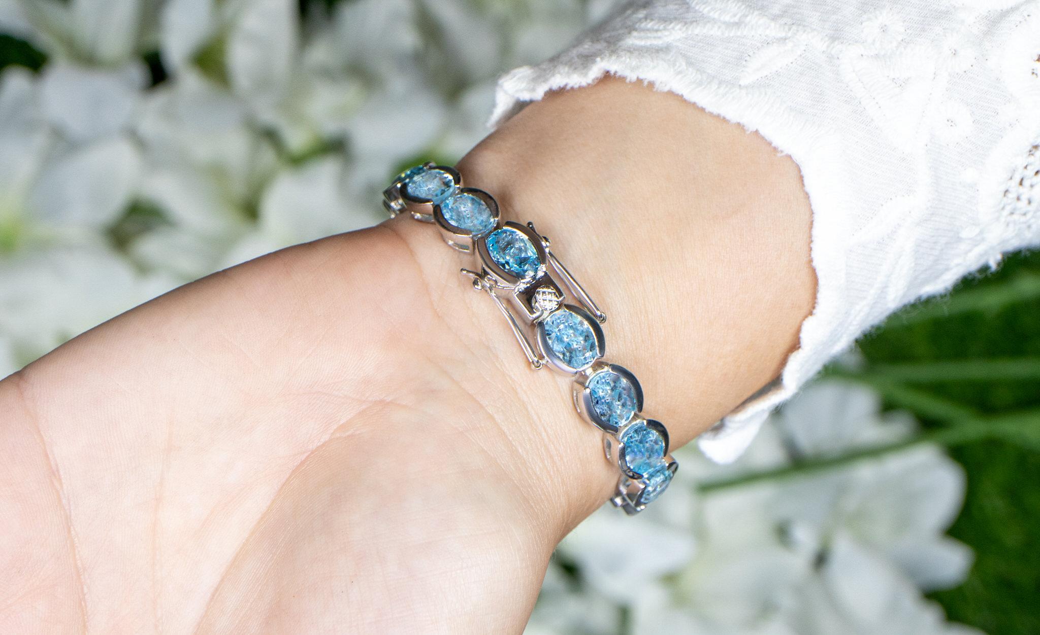 Blue Topaz Tennis Bracelet 43.6 Carats Rhodium Plated Sterling Silver In Excellent Condition For Sale In Aliso Viejo, CA
