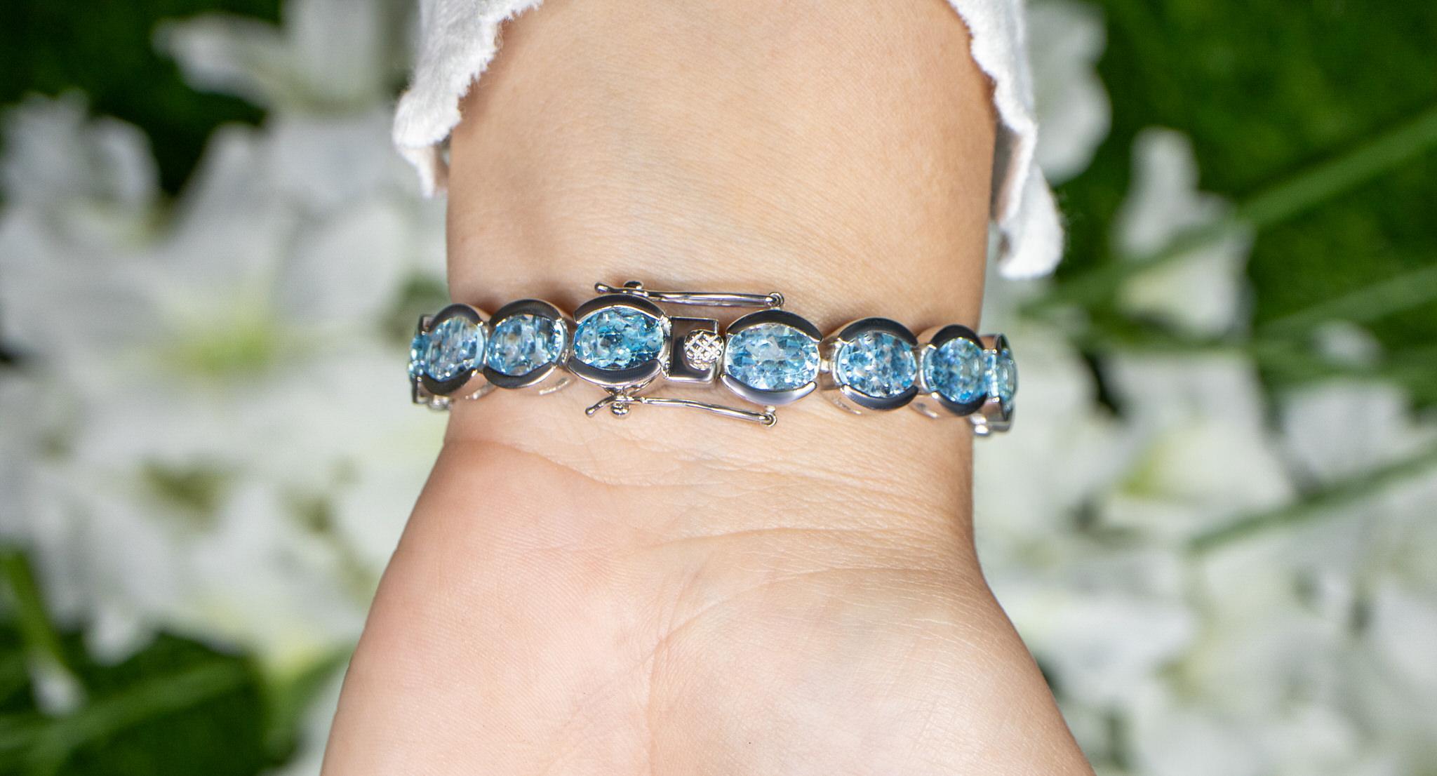 Women's or Men's Blue Topaz Tennis Bracelet 43.6 Carats Rhodium Plated Sterling Silver For Sale