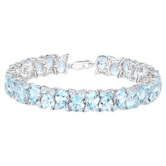 Blue Topaz Tennis Bracelet 58 Carats Rhodium Plated Sterling Silver