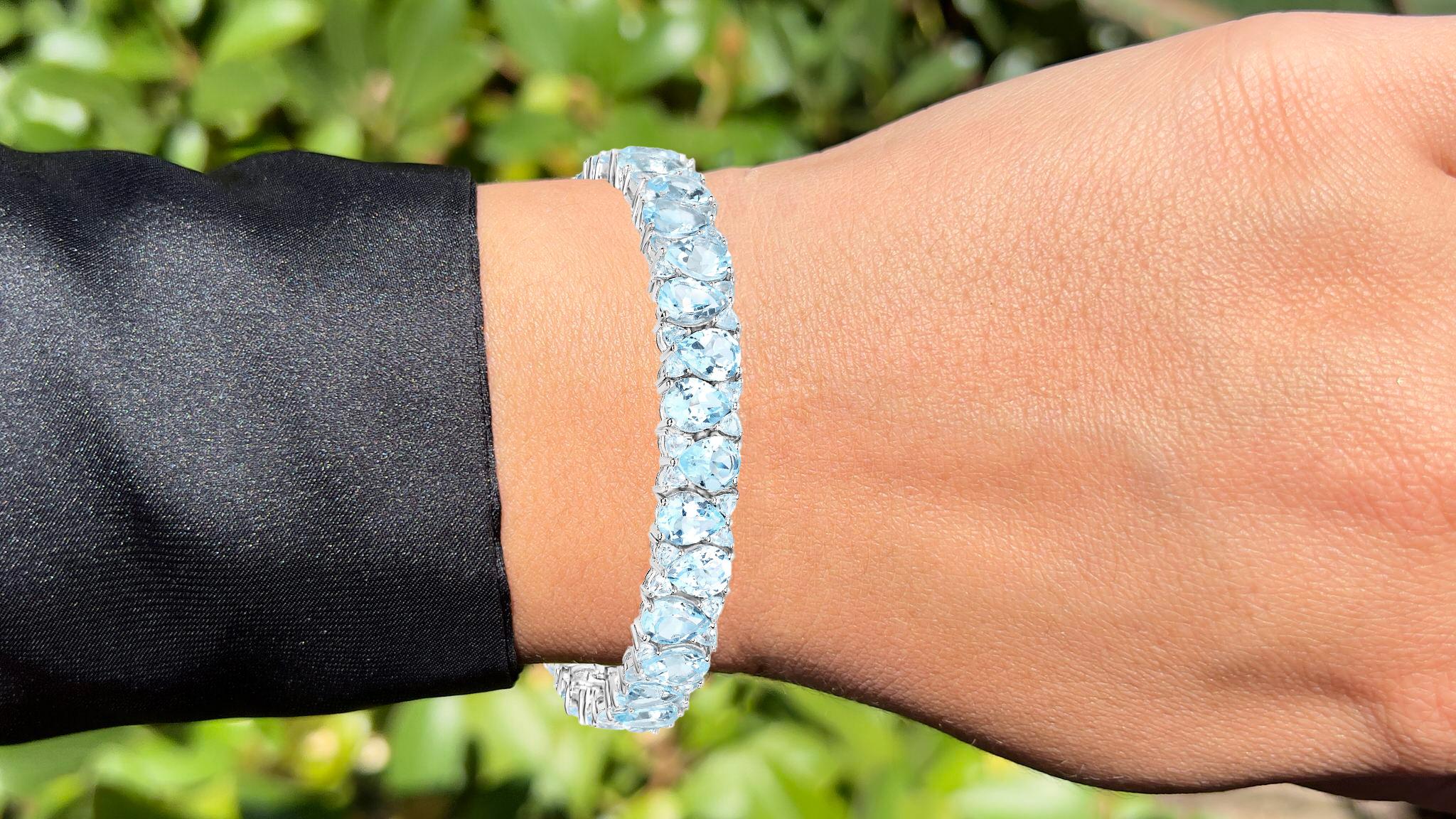 It comes with the appraisal by GIA GG/AJP
All Gemstones are Natural
78 Blue Topazes = 58.76 Carats
Metal: Rhodium Plated Sterling Silver
Length: 7.5 Inches

