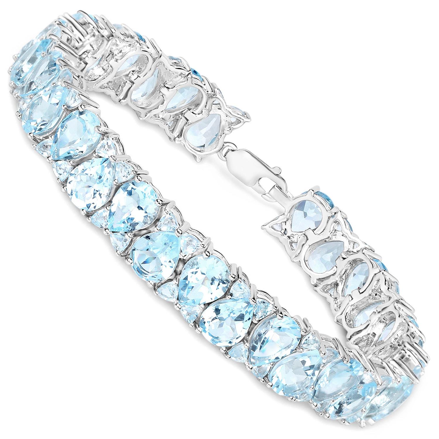 Contemporary Blue Topaz Tennis Bracelet 58.76 Carats Rhodium Plated Sterling Silver For Sale