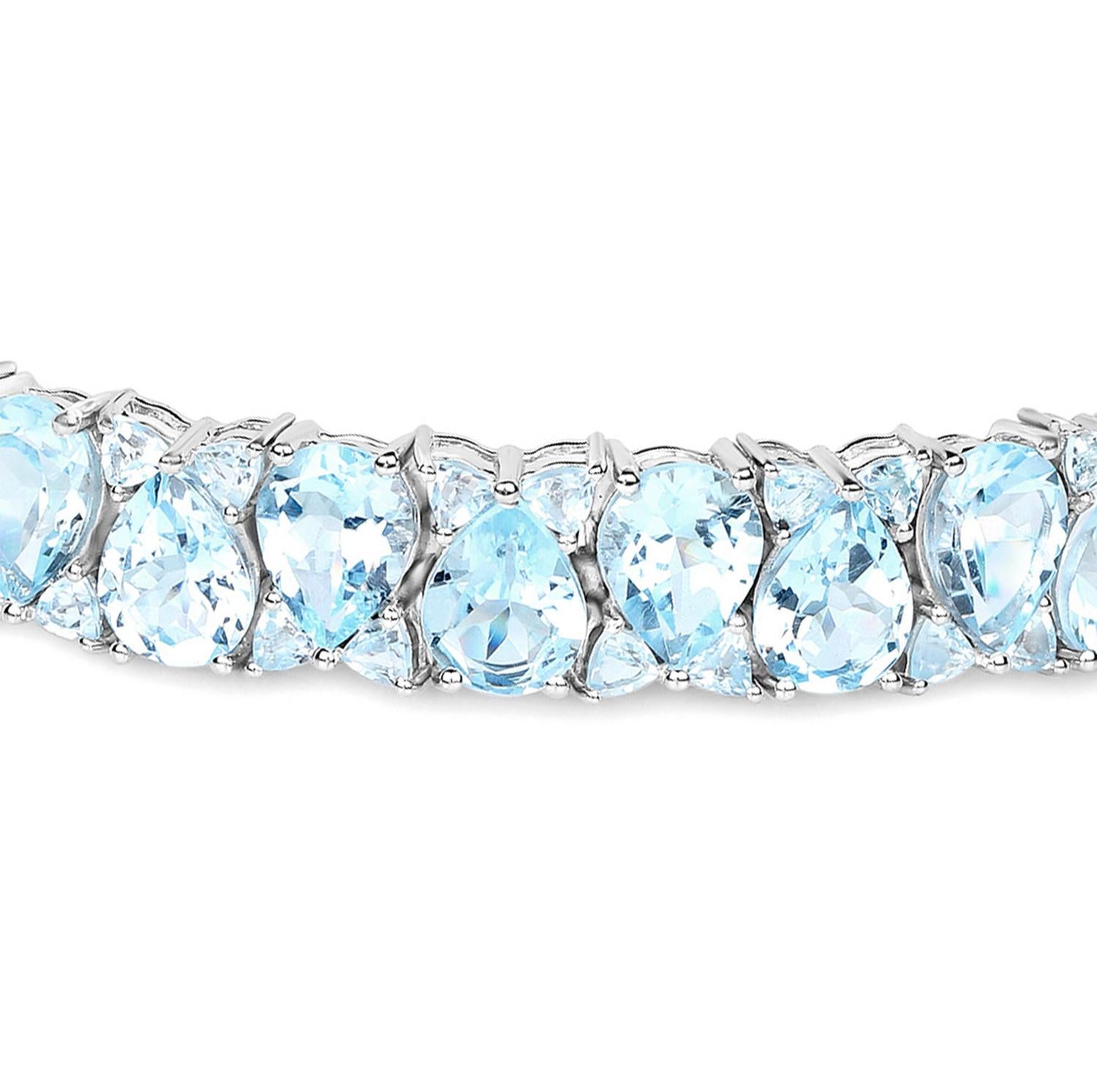Pear Cut Blue Topaz Tennis Bracelet 58.76 Carats Rhodium Plated Sterling Silver For Sale