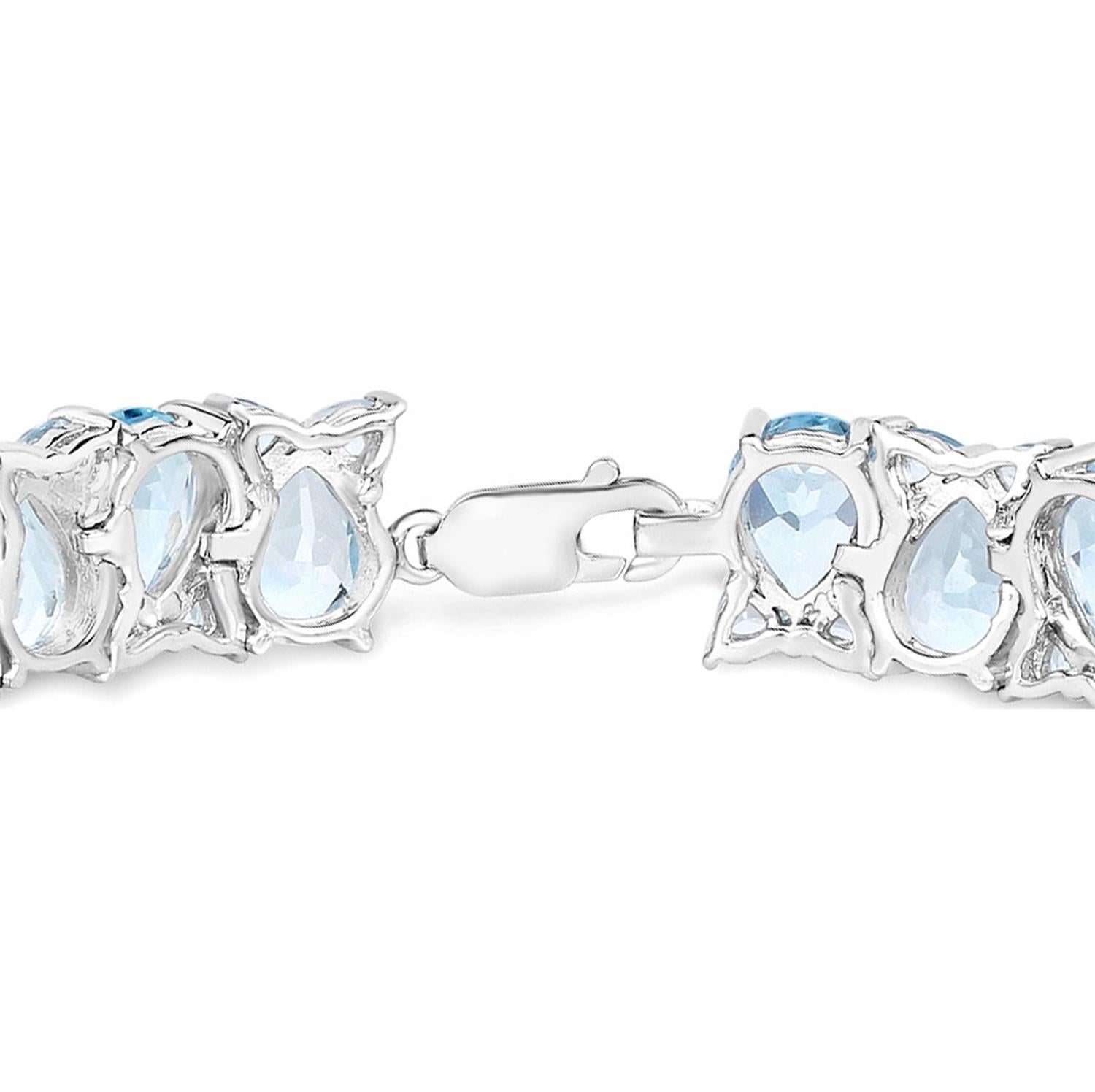 Blue Topaz Tennis Bracelet 58.76 Carats Rhodium Plated Sterling Silver In Excellent Condition For Sale In Aliso Viejo, CA