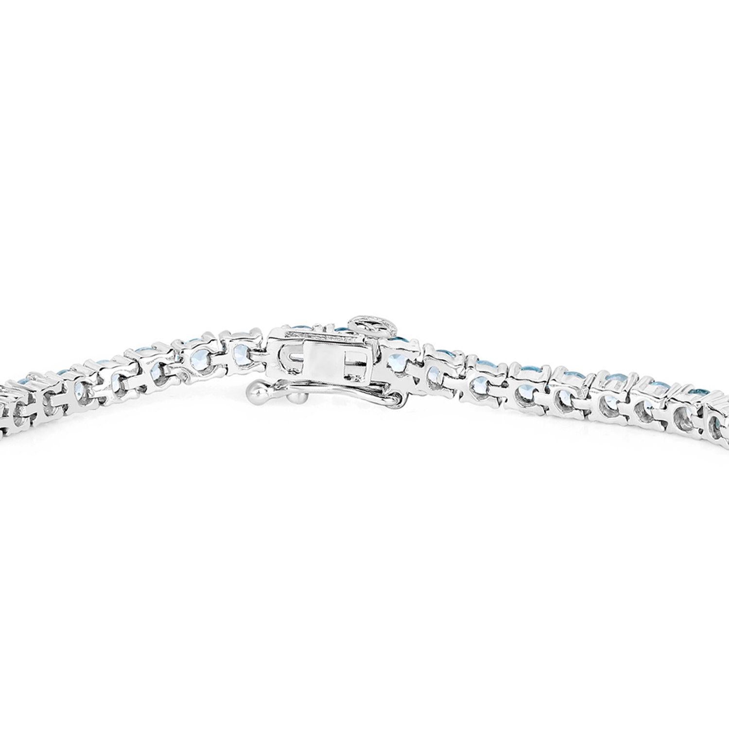 Pulsera de Tenis de Topacio Azul 6.3 Quilates Plata de Ley en Excelente estado para la venta en Punta Gorda, FL