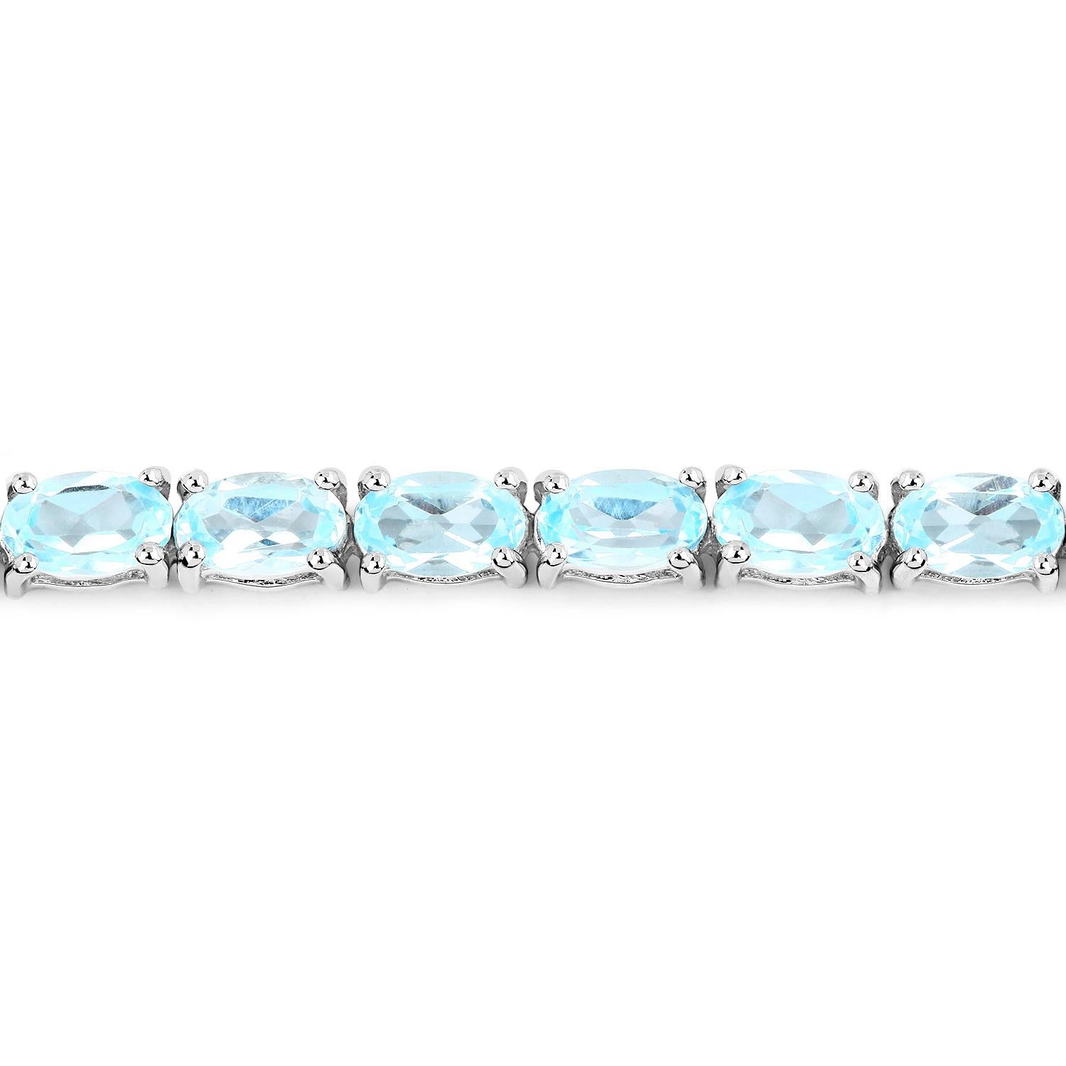 Contemporary Blue Topaz Tennis Bracelet 8.98 Carats 18K White Gold Plated Silver For Sale