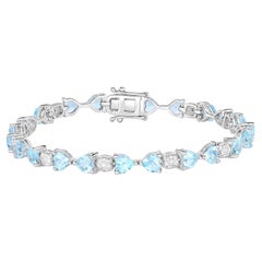 Bracelet de tennis en topaze bleue diamants 11 carats argent sterling