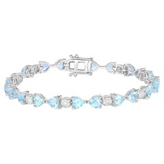 Blue Topaz Tennis Bracelet With Diamonds 11 Carats Sterling Silver