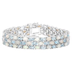Blue Topaz Tennis Bracelet With Opal 22.2 Carats Sterling Silver