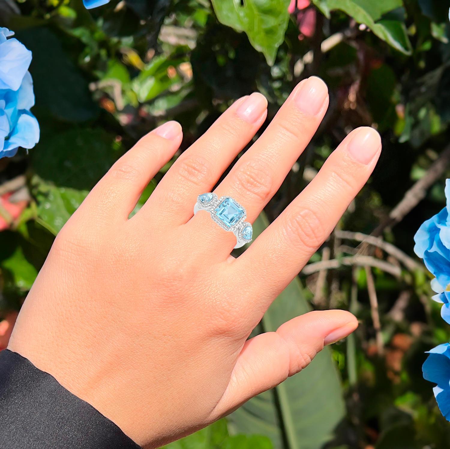 Mixed Cut Blue Topaz Three Stone Ring 3.85 Carats Sterling Silver For Sale