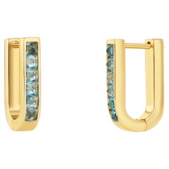 Boucles d'oreilles en forme de U en topaze bleue