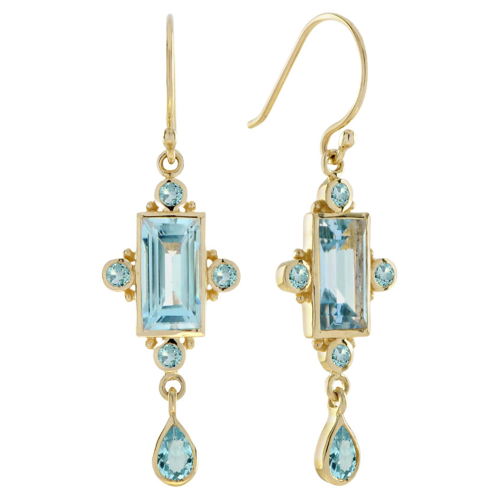Orecchini a goccia in stile vintage con topazio blu e oro giallo 14 carati