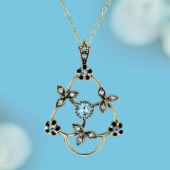 Blue Topaz Vintage Style Floral Pendant in 9K Yellow Gold