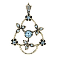 Blue Topaz Vintage Style Floral Pendant in 9K Yellow Gold
