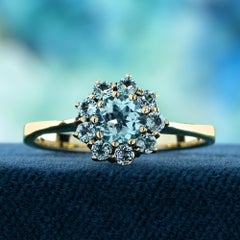 Blue Topaz Vintage Style Floral Ring in Solid 9K Yellow Gold