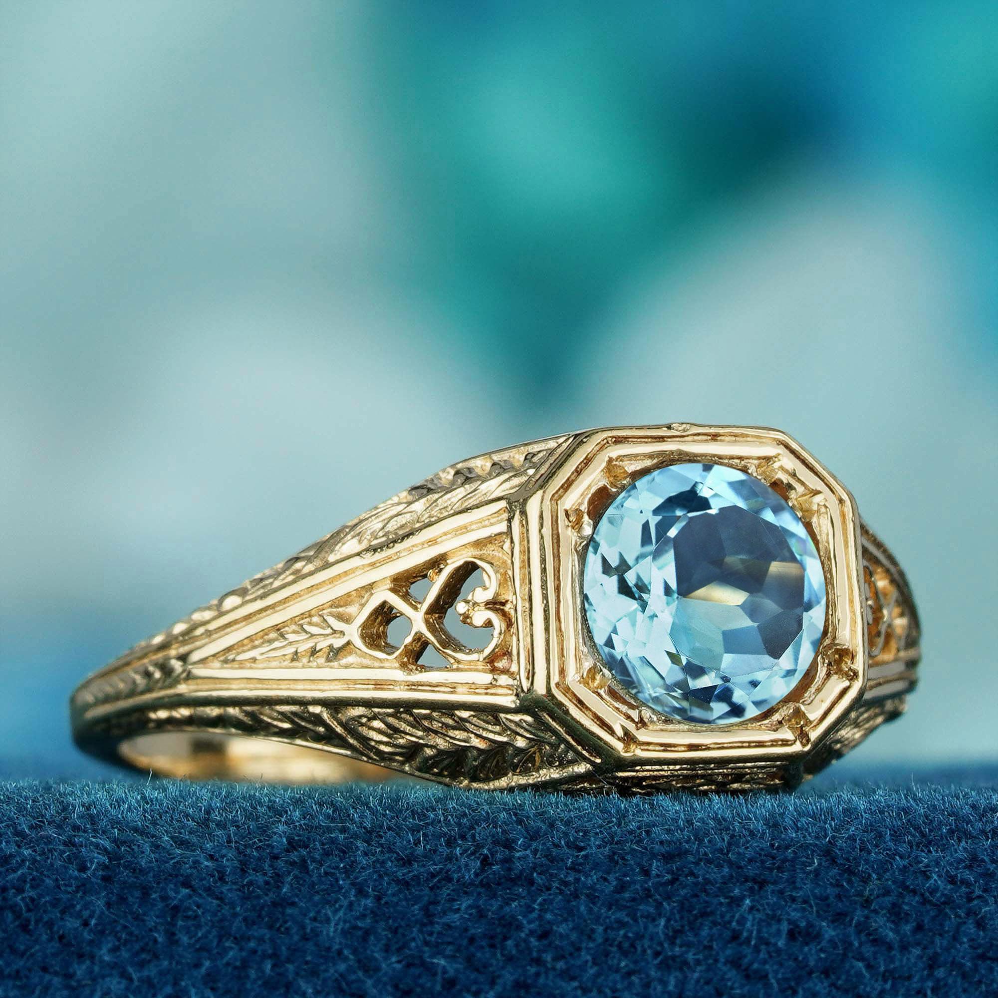 Edwardian Blue Topaz Vintage Style Halo Ring in Solid 9K Yellow Gold For Sale