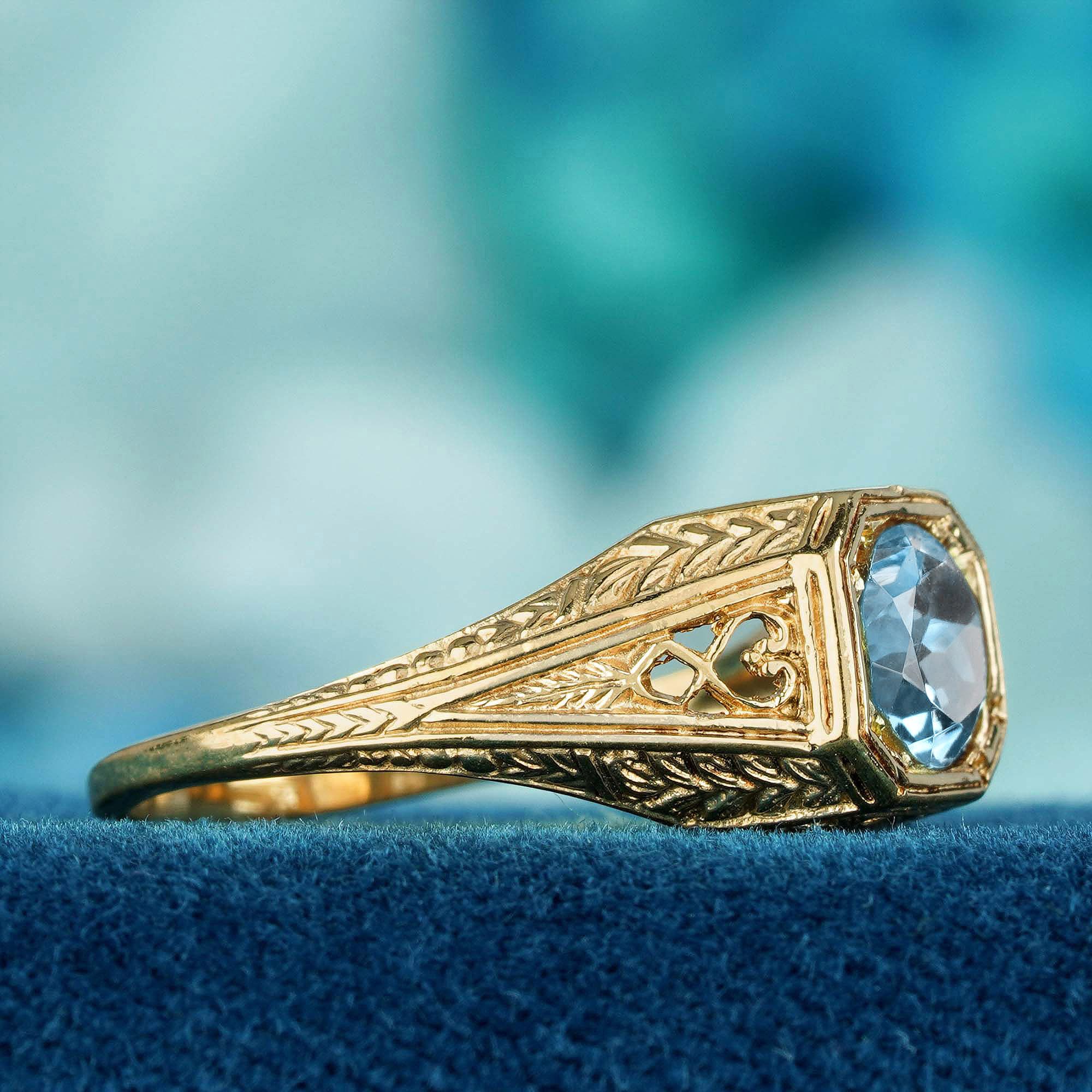 Round Cut Blue Topaz Vintage Style Halo Ring in Solid 9K Yellow Gold For Sale