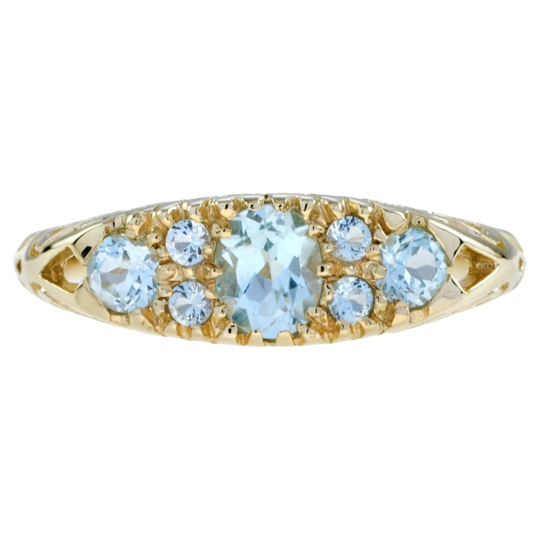 For Sale:  Blue Topaz Vintage Style Three Stone Filigree Ring in 14K Yellow Gold 2