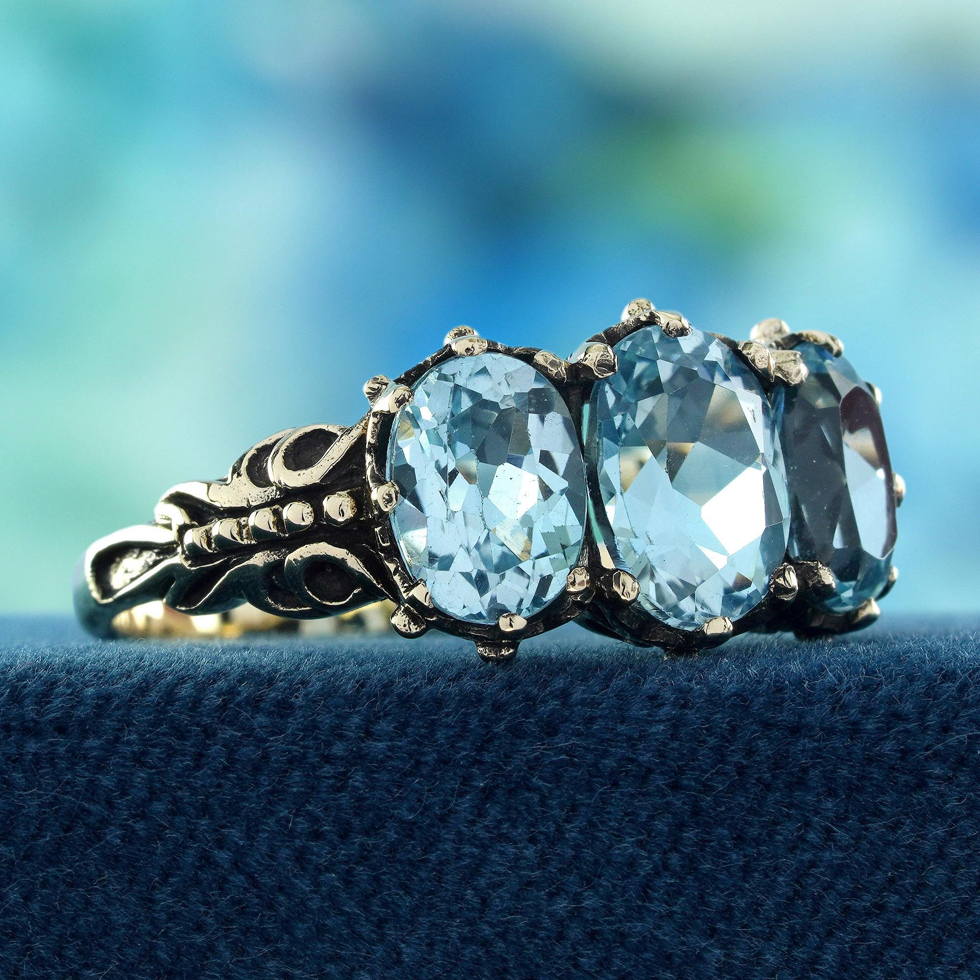 Victorian Blue Topaz Vintage Style Three Stones  Ring in Solid 9K Yellow Gold For Sale