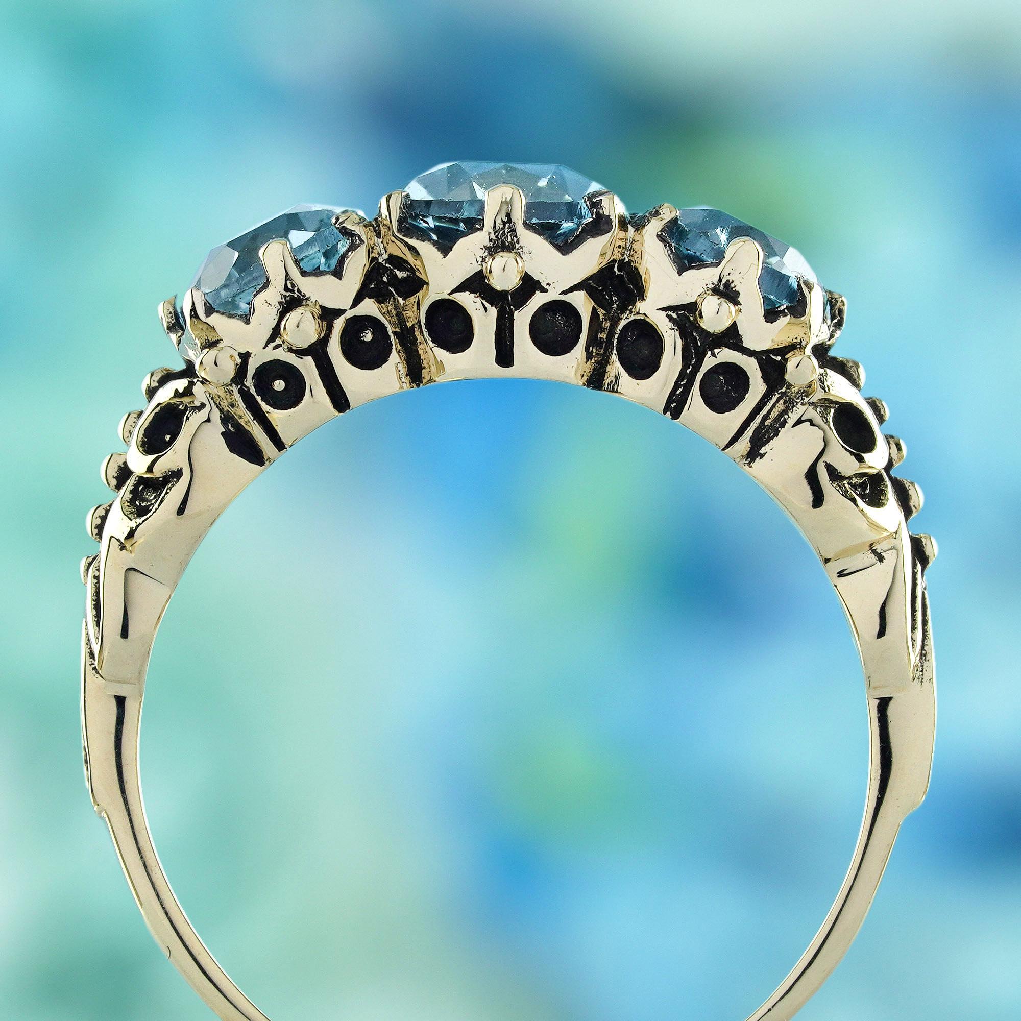Blue Topaz Vintage Style Three Stones  Ring in Solid 9K Yellow Gold In New Condition For Sale In Bangkok, TH