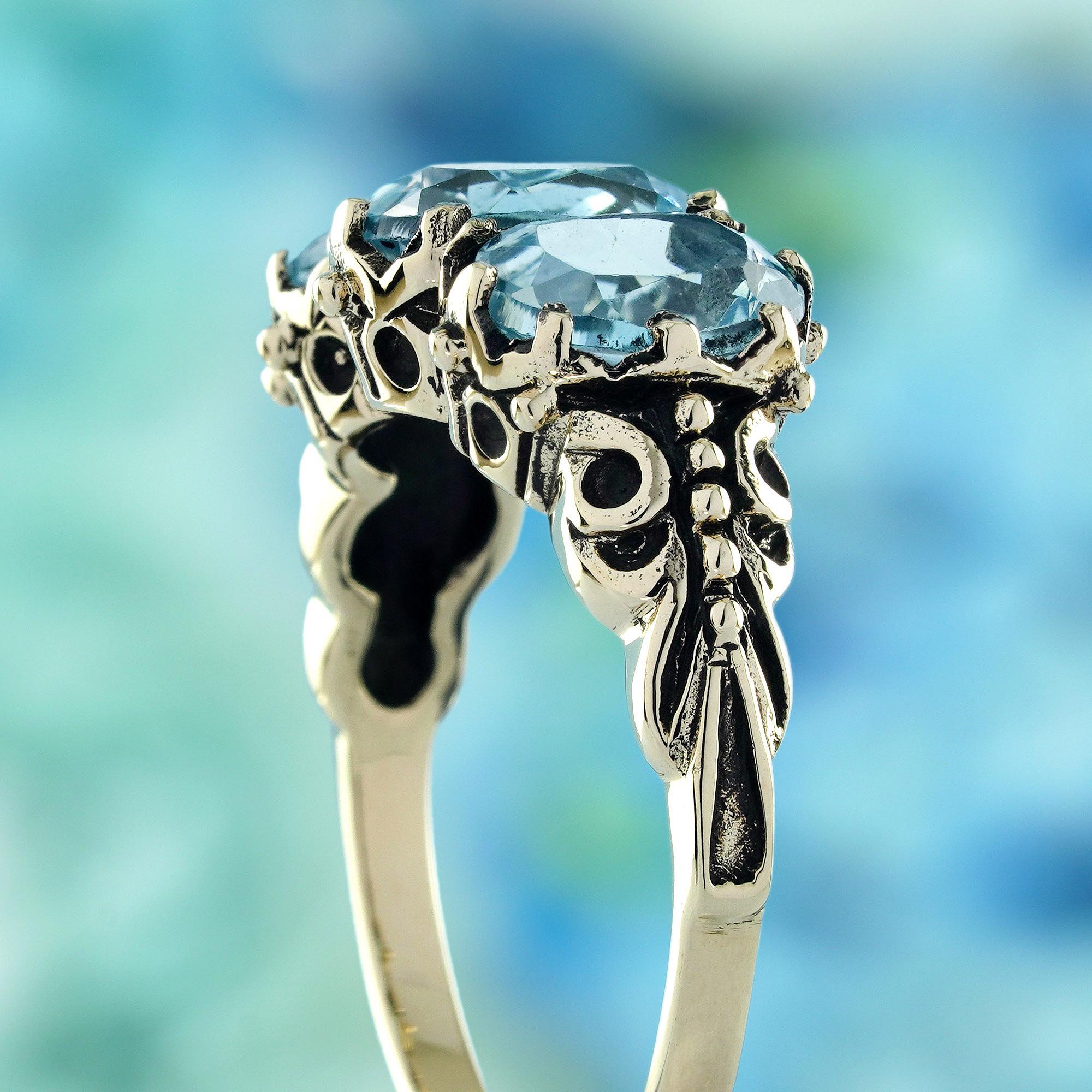 Women's Blue Topaz Vintage Style Three Stones  Ring in Solid 9K Yellow Gold For Sale