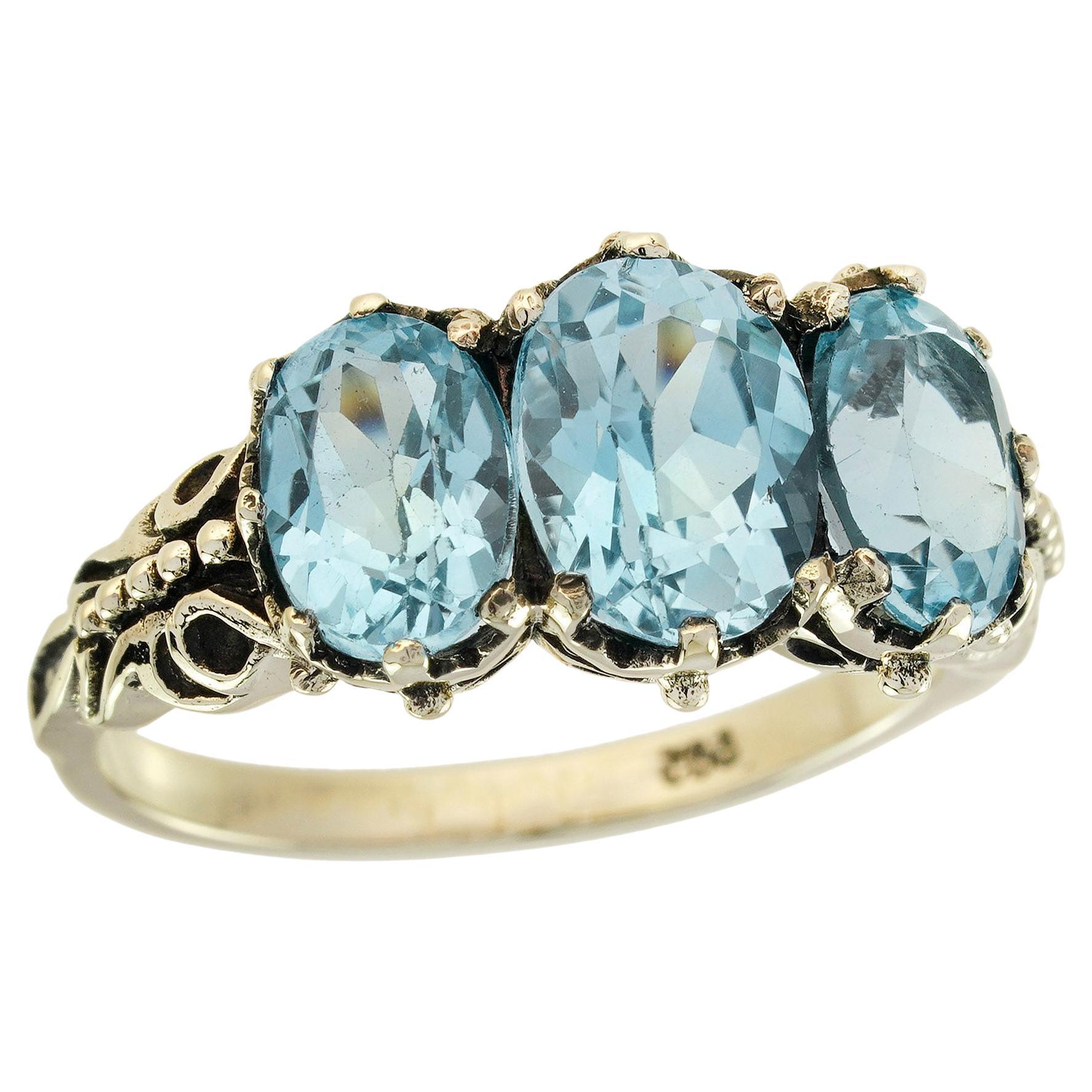 Blue Topaz Vintage Style Three Stones  Ring in Solid 9K Yellow Gold For Sale