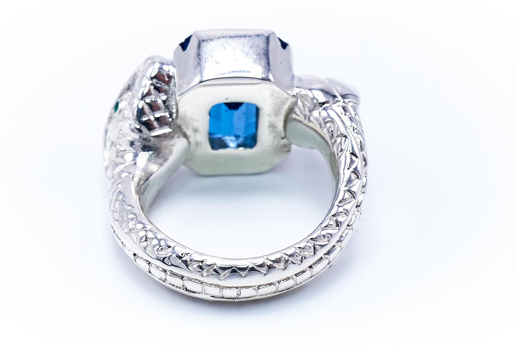 Contemporary Blue Topaz White Diamond Emerald Silver Snake Ring For Sale