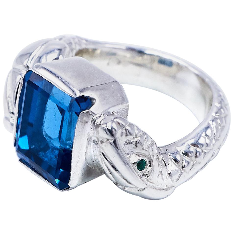 Bague serpent en argent, topaze bleue, diamant blanc et émeraude en vente