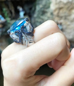 Blue Topaz with Blue Sapphire and Diamond Ring in 18 Karat White Gold Settings