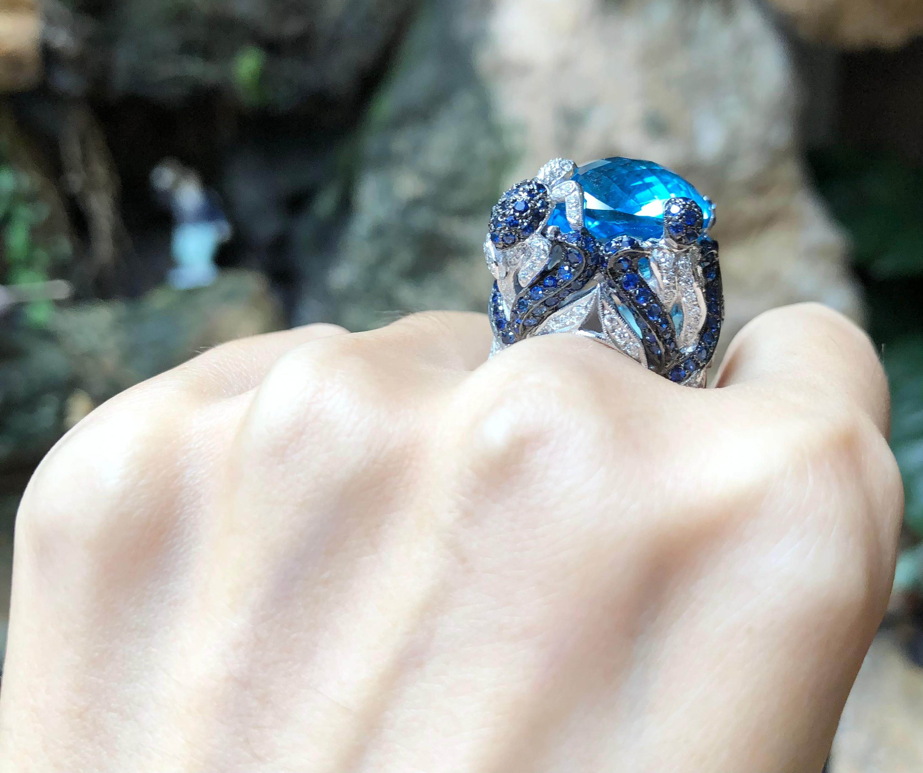 Contemporary Blue Topaz with Blue Sapphire and Diamond Ring in 18 Karat White Gold Settings For Sale