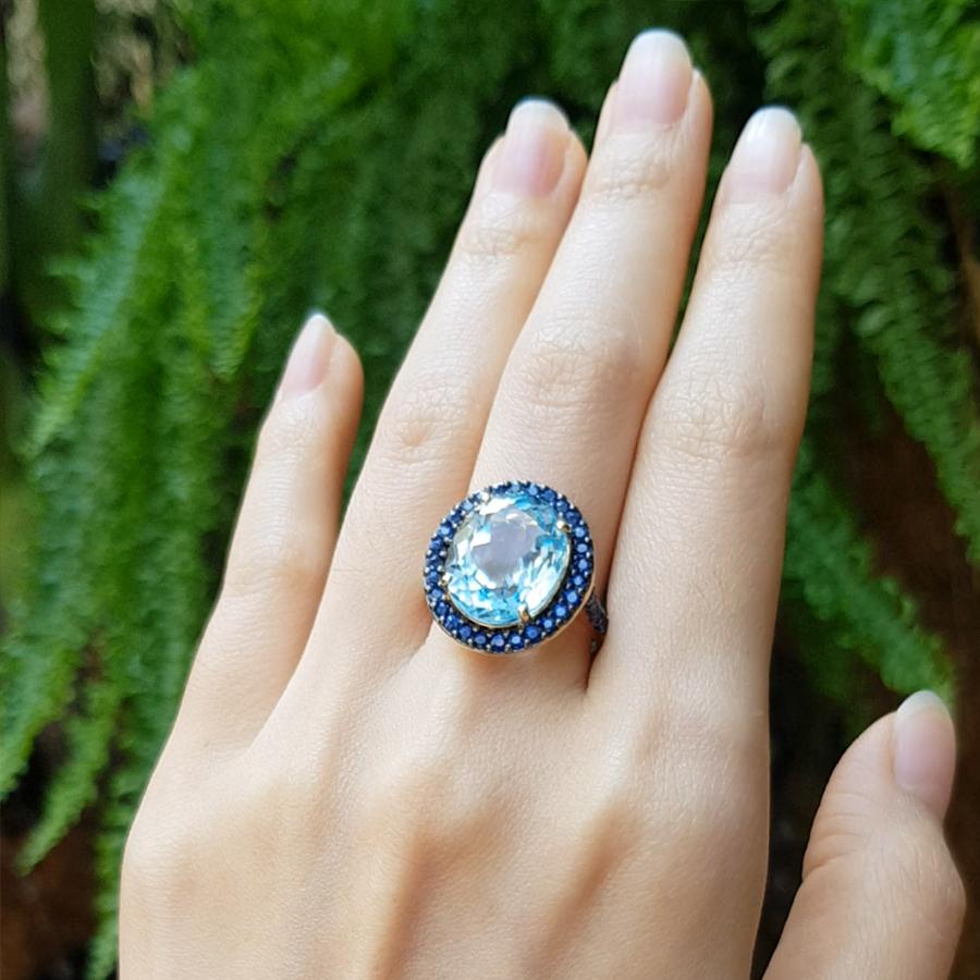 Blue Topaz 9.97 carats with Blue Sapphire 1.5 carats Ring set in 18 Karat Gold Settings 

Width:  1.9 cm 
Length: 2.0 cm
Ring Size: 55
Total Weight: 8.85 grams

