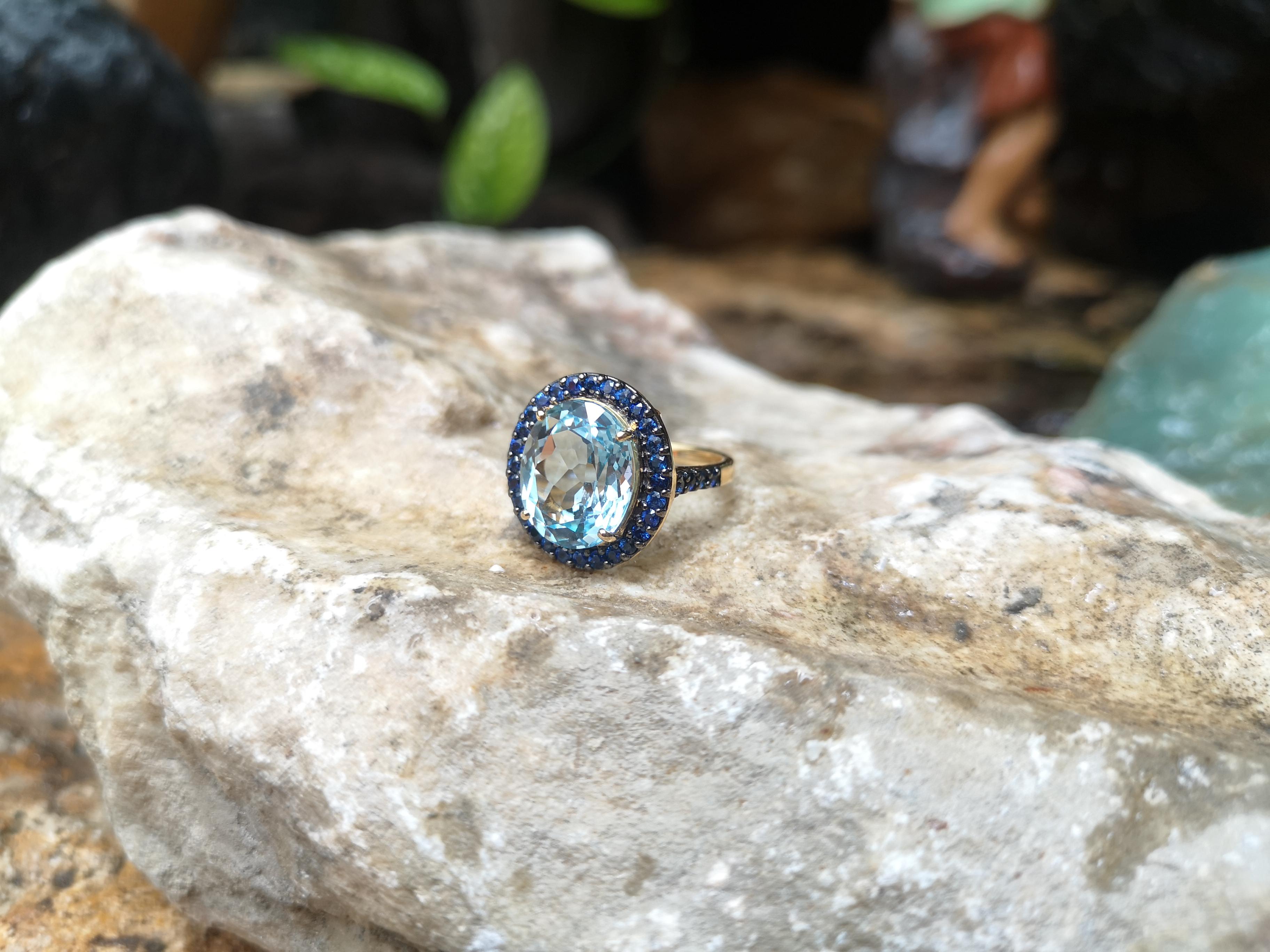 Oval Cut Blue Topaz with Blue Sapphire Ring Set in 18 Karat Gold Settings For Sale