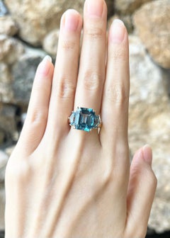 Anello con Topazio Blu e Topazio Blu incastonato in oro 14K