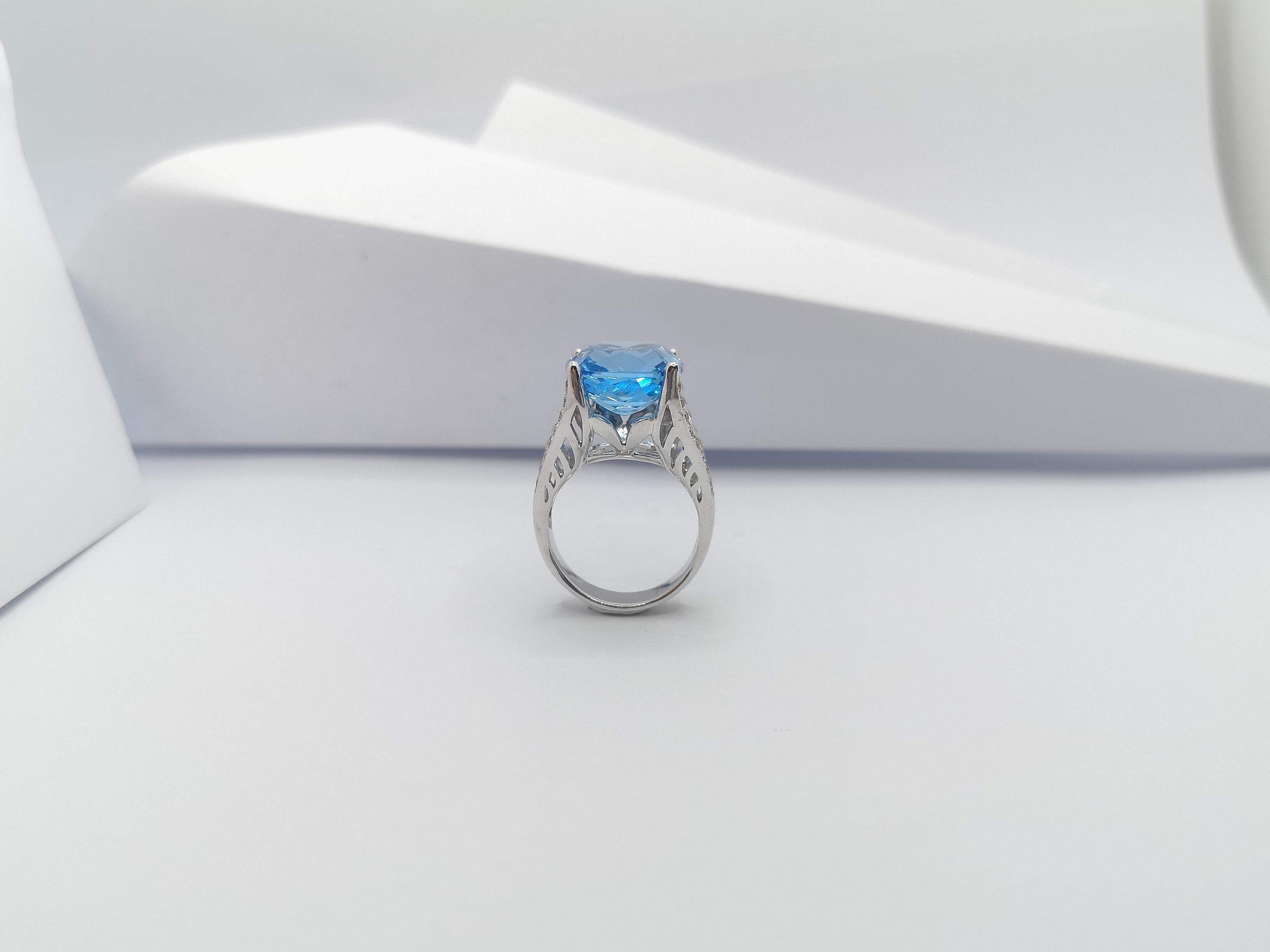 Bague en or blanc 18 carats sertie d'une topaze bleue et d'un diamant brun en vente 9