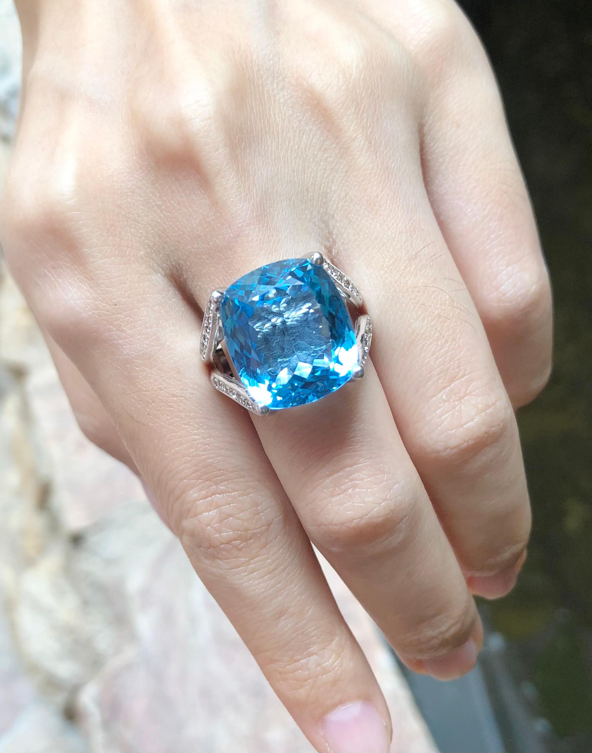 Women's Blue Topaz with Brown Diamond Ring Set in 18 Karat White Gold Settings For Sale