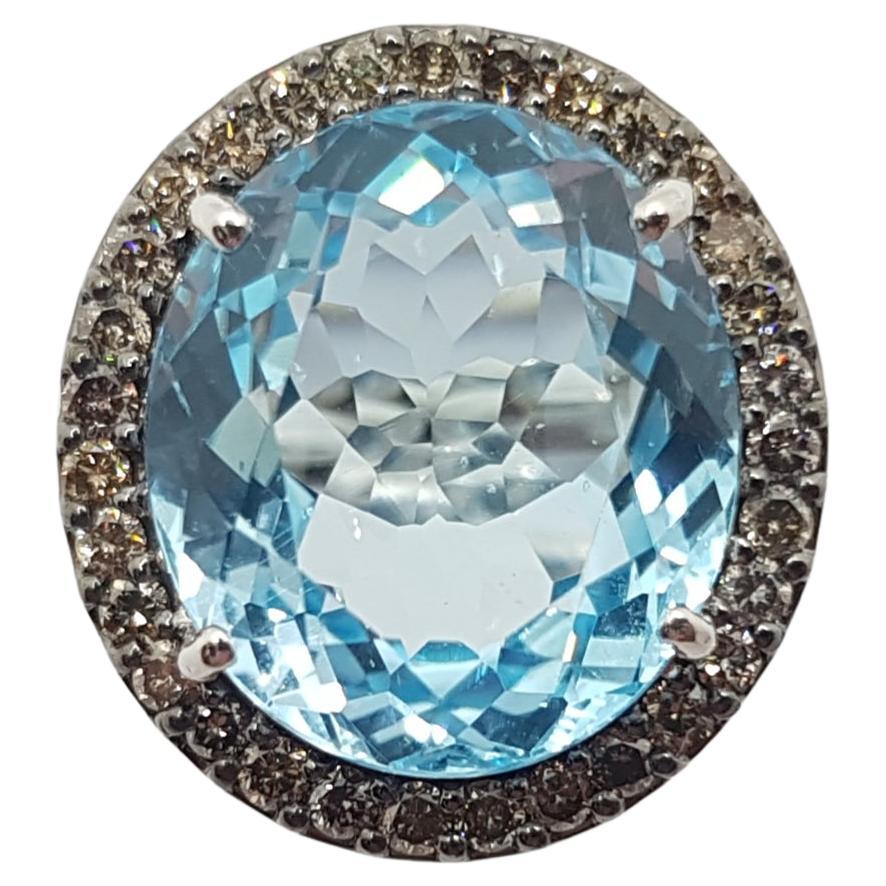 Blue Topaz with Brown Diamond Ring Set in 18 Karat White Gold Settings For Sale