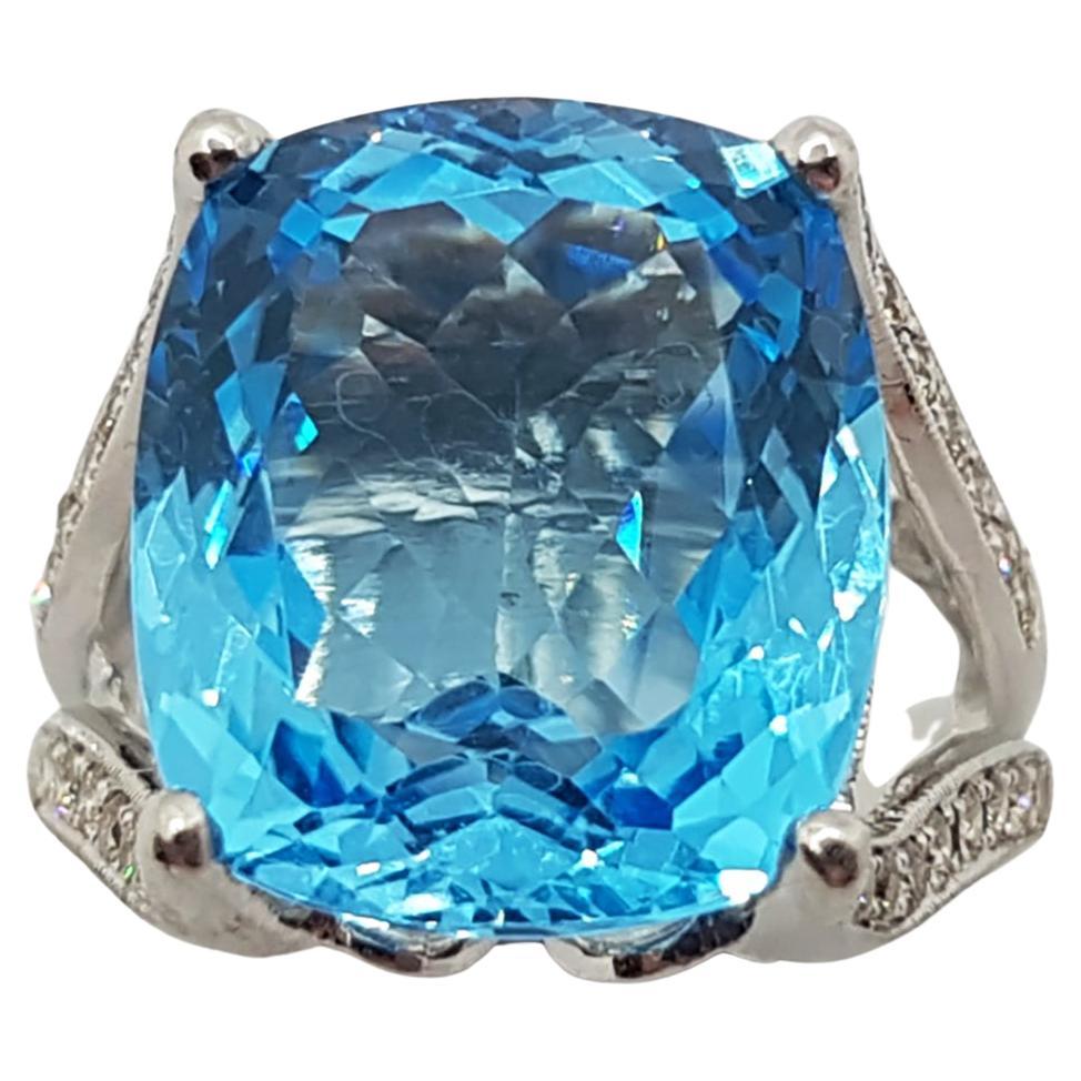 Blue Topaz with Brown Diamond Ring Set in 18 Karat White Gold Settings For Sale