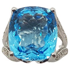 Blue Topaz with Brown Diamond Ring Set in 18 Karat White Gold Settings