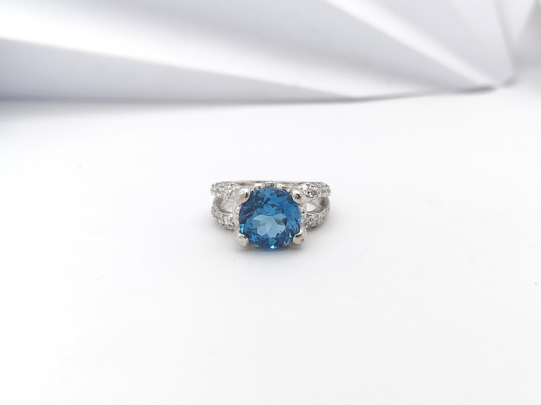 Women's Blue Topaz with Cubic Zirconia Ring set in Silver Settings For Sale
